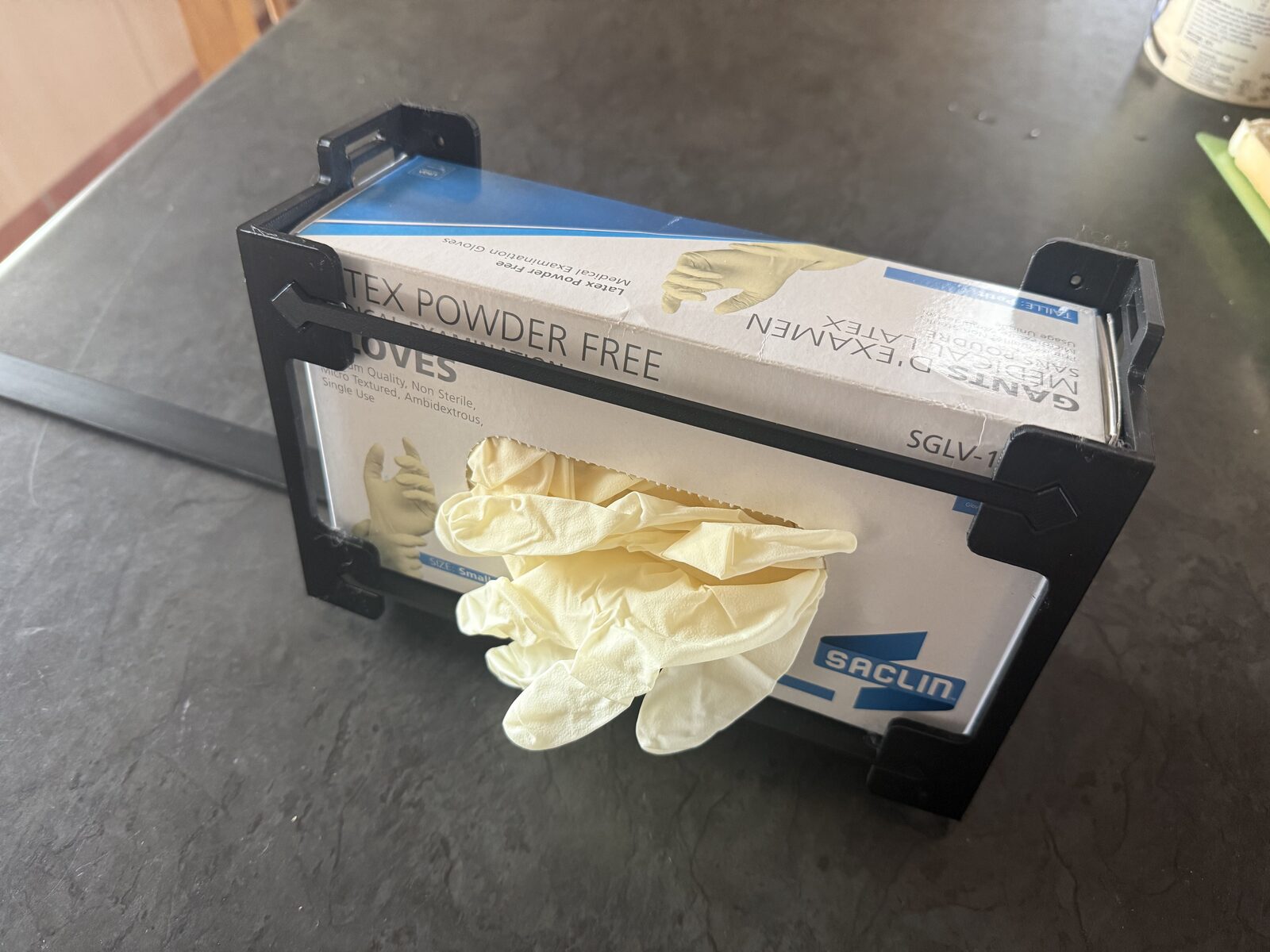 Medical glove box in a 3D-printed holder